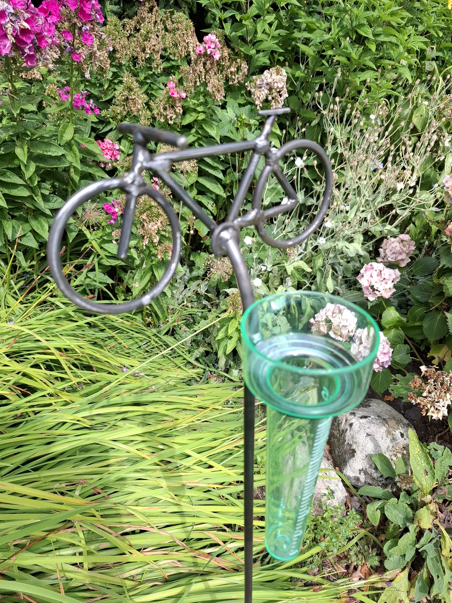 Leuke regenmeter met fiets 3